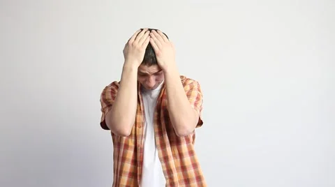 Young man closing his face Stock Footage 60407705