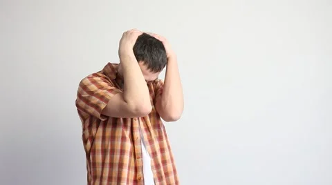 Young man closing his face Stock Footage 60407723