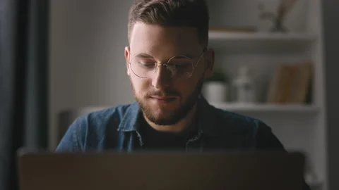 Young man coder at home Stock Footage 214418446