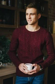 Young man with coffee Stock Photos