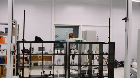 Young man come to make a 3D scan of her own in research lab Stock Footage 62728907