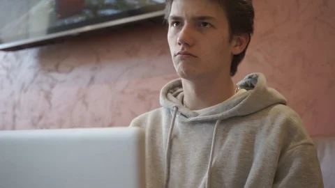 Young man communicates in a messenger Stock Footage 127751841