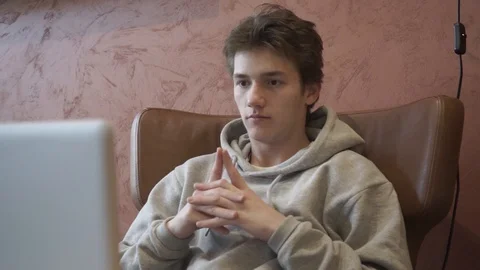 Young man communicates in a messenger Stock Footage 127752115