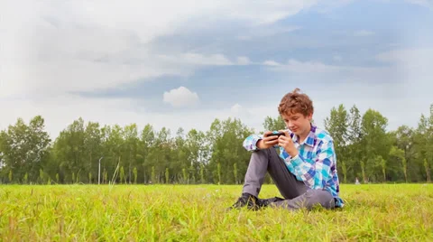 Young man communicates on the smartphone Stock Footage 29553466