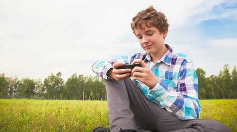 Young man communicates on the smartphone Stock Footage 35849696