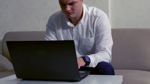 Young man concentrating on his work Stock Footage 111293420