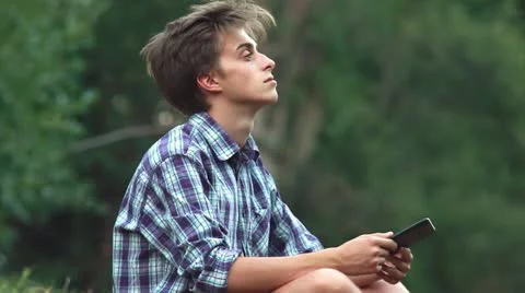 Young man contemplating on Campus Video stock 11598486