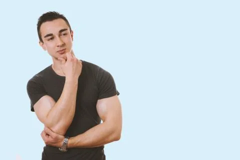 Young man contemplating an idea Stock Photos