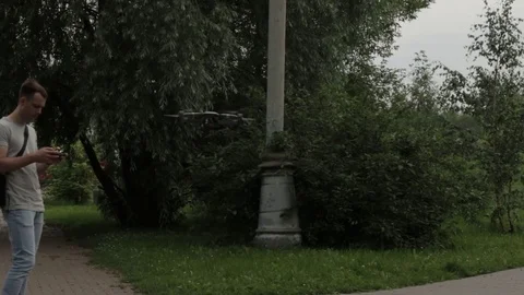 The young man controls a drone Video stock 77627356