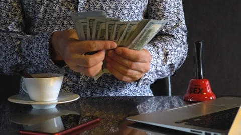 A young man counts dollars. Stock Footage 114381202