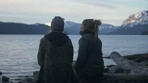 Young Man Covering Two Young Women with a blanket Stock-Footage 137599225