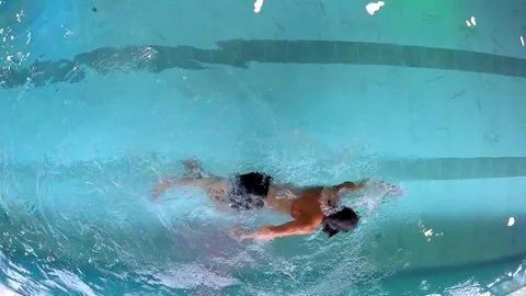 Young Man Crawl Swimming in the Pool Stock Footage 85157128