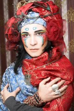 Young man in creative eastern image Stock Photos