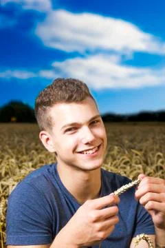 Young man in a crop field Stock Photos