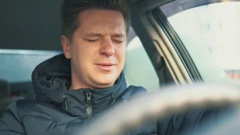 Young man crying in the car. depression Stock Footage 99199775