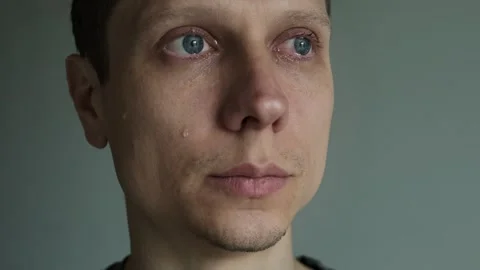 Young Man Crying Closeup. Having Mental Problems, Dealing with Death in the Video stock 308943192