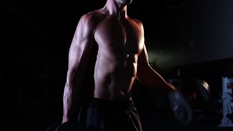 Young Man Curling Weights Stock Footage 73405876