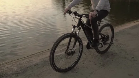Young man cycling Stock Footage 130473078