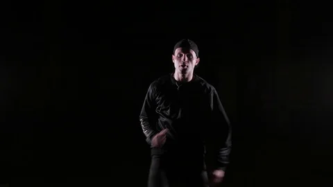 Young man dancing break dance, hip hop, street dancing in the studio, isolated Video stock 121515094