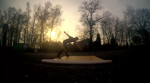 Young man dancing breakdance on the street at sunset Stock Footage 48683002