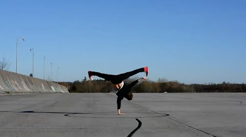 Young man dancing breakdance on the street Video stock 57177734