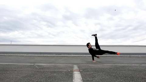 Young man dancing breakdance on the street. Stock Footage 73173915