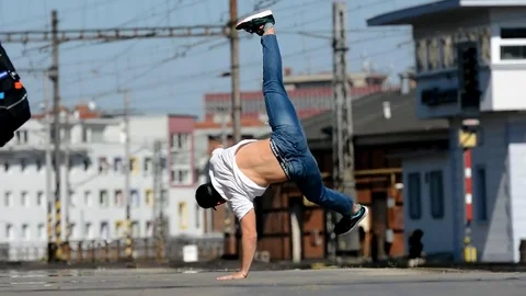 Young man dancing breakdance on the street. Stock Footage 74081317