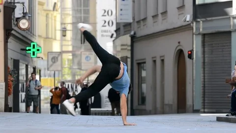 Young man dancing breakdance on the street. Stock Footage 74081348