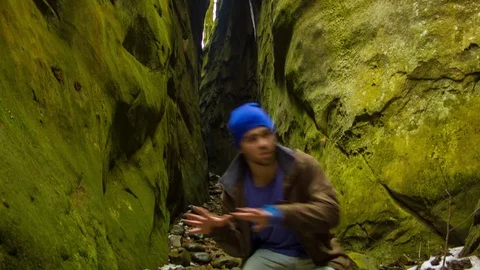 Young man dancing in the canyon 스톡 동영상 82547902