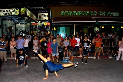 A young man dancing in front of the audience on Bangla Road. Stock Photos