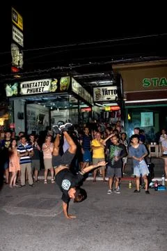 A young man dancing in front of the audience on Bangla Road. Stock Photos