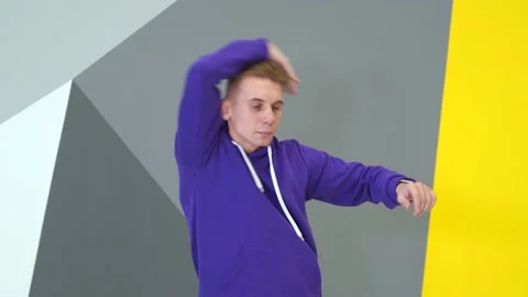 Young man dancing hip hop, modern youth dance free style in the studio. Stock Footage 142820173