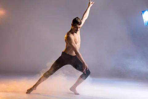 Young man dancing Stock Photos