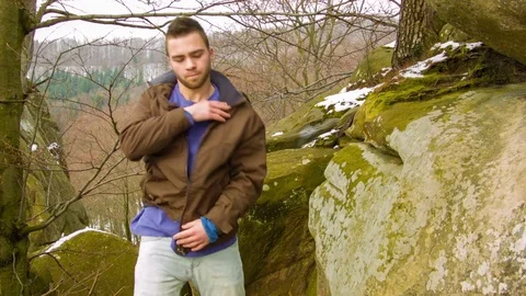 Young man dancing on a rock Video stock 81164065