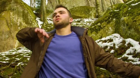 Young man dancing on a rock Video stock 81230786