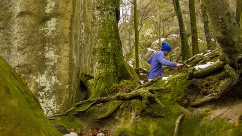 Young man dancing on a rock Stock Footage 82107637