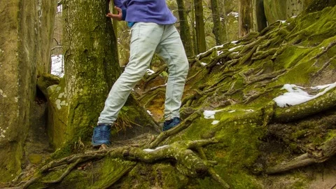 Young man dancing on a rock 스톡 동영상 82375202
