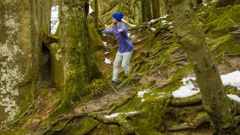 Young man dancing on a rock Video stock 82377908