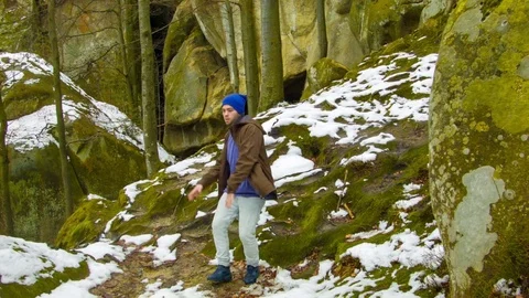 Young man dancing on a rock Video stock 82502126