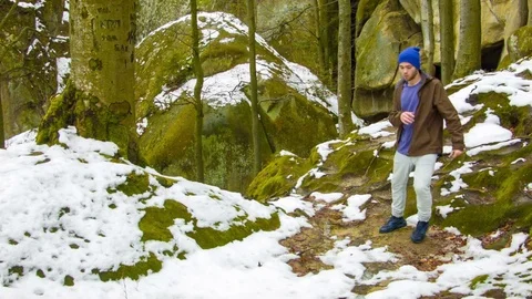Young man dancing on a rock Stock-Footage 82503113