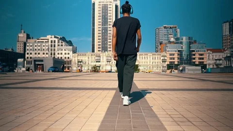 Young man dancing on the run outdoors Stock Footage 127867738