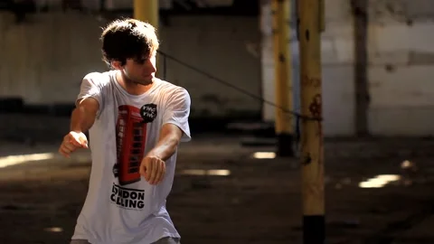 Young man dancing in studio Break Dancer, Hip Hop with lights, smoke Stock Footage 159609841