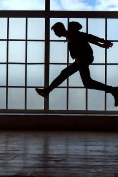 Young man is in the dark. Stock Photos