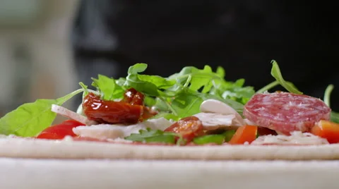 Young man decides to make home made Pizza for Dinner. Stock Footage 63014662