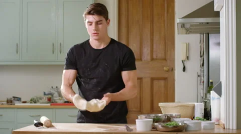 Young man decides to make home made Pizza for Dinner. Stock Footage 63018142