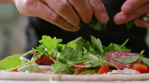 Young man decides to make home made Pizza for Dinner. Video stock 63021600