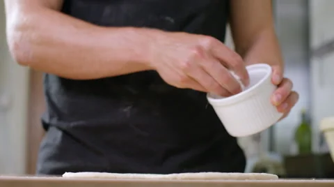 Young man decides to make home made Pizza for Dinner. Video stock 63022334