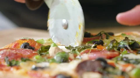 Young man decides to make home made Pizza for Dinner. Video stock 63023088