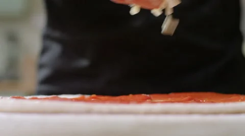 Young man decides to make home made Pizza for Dinner. Video stock 63025219