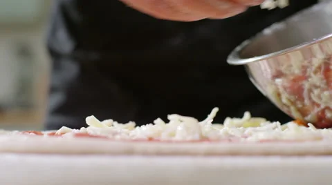 Young man decides to make home made Pizza for Dinner. Stock Footage 63032406